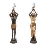 <span class='ref_item'>247 -</span> <span class="object_title">PAREJA DE FIGURAS EGIPCIAS CON LÁMPARAS, S.XX</span>   <p><span class="technique_material">Bronce patinado</span><br><span class="technical_description">Figuras realizadas en bronce patinado representando a un hombre y una mujer del antiguo Egipto. Transformadas en lámparas, sosteniendo en sus manos las correspondientes tulipas. Presentan desperfectos.<br/>Altura: 147cm</span><br></p>