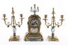 <span class='ref_item'>193 -</span> <span class="object_title">GUARNICIÓN DE RELOJ Y CANDELABROS DE BRONCE DORADO Y PORCELANA TIPO SÈVRES, FRANCIA, FFS.S.XIX</span>   <p><span class="technical_description">Firmado en la esfera "Paul Lava à St. Denis". Maquinaria París. <br/>Reloj 36 cm altura.<br/>Candelabros 33 cm altura.<br/>Faltan péndulo y llave.</span><br></p>