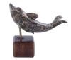 <span class='ref_item'>237 -</span> <span class="object_title">FIGURA DE DELFÍN EN JASPE OCEÁNICO SOBRE PEDESTAL DE MADERA</span>  <p><span class="technical_description">Figura tallada de delfín, realizada en jaspe oceánico pulido, con soporte metálico sobre pedestal de madera.</span><br>Peso: <span class="PESO_HCES1">50,30</span> <span class="PESOUMED_HCES1">gr.</span><br></p>