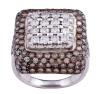 <span class='ref_item'>81 -</span> <span class="object_title">SORTIJA EN ORO 18 KT Y DIAMANTES BROWN E INCOLOROS   </span>  <p><span class="technical_description">Sortija realizada en oro de 18 kt, con contraste. De diseño geométrico con detalle central de diamantes incoloros en talla brillante engastados en grano, con un peso total aprox de 1.38ct, acompañados por diamantes brown en talla brillante engastados en grano, con vistas en negro, y un peso total aprox de 3.20ct. <br/>Peso total aprox de todos los diamantes: 4.58ct.<br/>Medida Sortija: 14</span><br>Peso: <span class="PESO_HCES1">11,80</span> <span class="PESOUMED_HCES1">gr.</span><br></p>