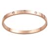 <span class='ref_item'>70 -</span> <span class="object_title">PULSERA RÍGIDA EN METAL CHAPADO EN ORO ROSA CON CIRCONITAS</span>  <p><span class="technical_description">Pulsera rígida unisex estilo Cartier realizada en metal chapado en oro rosa. Adornadas con 10 circonitas alrededor<br/>Cierre: Clic<br/>Medidas: 6,5 x 5,5cm</span><br>Peso: <span class="PESO_HCES1">21,10</span> <span class="PESOUMED_HCES1">gr.</span><br></p>