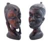 <span class='ref_item'>165 -</span> <span class="object_title">PAREJA DE ESCULTURAS DE HOMBRE Y MUJER AFRICANOS EN ACAJOU</span>   <p><span class="technical_description">Dos esculturas talladas a mano en madera de acajou (o caoba africano) con tonalidades en marrón y negro. Representan a una mujer y un hombre africanos, ella con tocado y coletas y él con gorro y barba.<br/>Altura: 30cm ambas<br/>Peso: 3372,6gr (1584,8gr + 1787,8gr)</span><br></p>