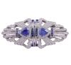 <span class='ref_item'>62 -</span> <span class="object_title">BROCHE ESTILO ART DÉCO EN PLATA DE LEY Y PIEDRAS AZULES E INCOLORAS</span>  <p><span class="technical_description">Elegante broche de doble clip, estilo Art Déco realizado en plata de ley. De forma ovalada con dos piedras azules centrales en talla trillón adornadas por piedras azules e incoloras, engastadas sobre bandas y carriles. <br/>Cierre: Aguja <br/>Medidas: 5 x 2,5cm</span><br>Peso: <span class="PESO_HCES1">19,10</span> <span class="PESOUMED_HCES1">gr.</span><br></p>